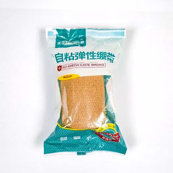 부직포로 만든 피부색의 접착력이 있고 탄력 있는 붕대
